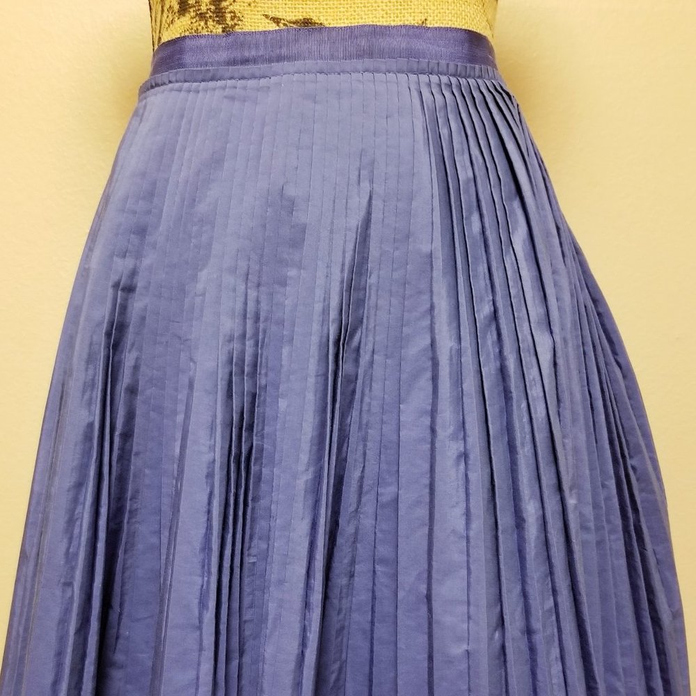 Accordion pleated women's blue knee length skirt w/ ribbon band waist